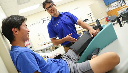 Students in Athletic training practicing